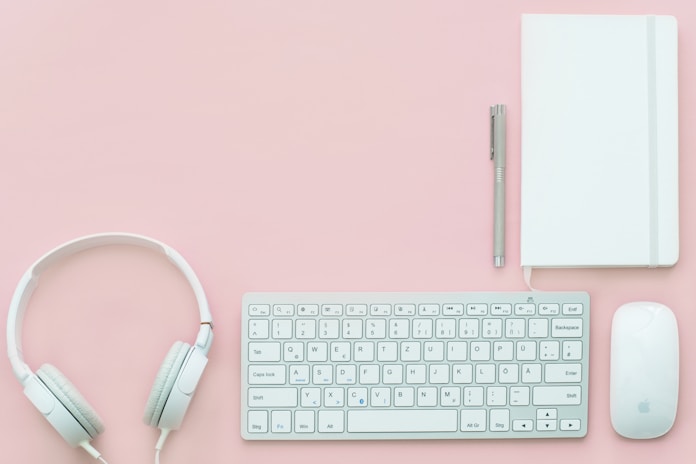 pink desk keyboard & headphones